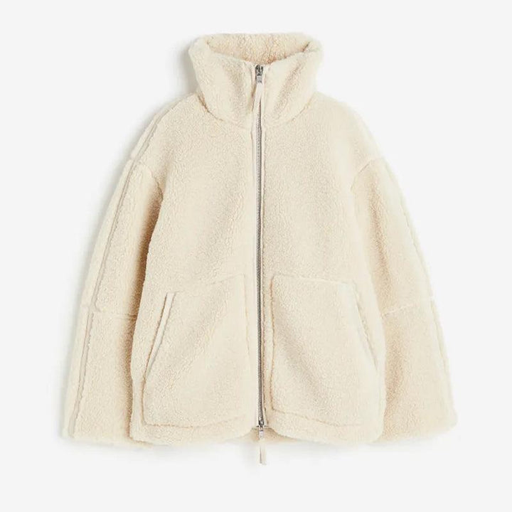 Veste pour Femme – Ligne Épurée et Moderne au Fil des Saisons, Coloris Blanc